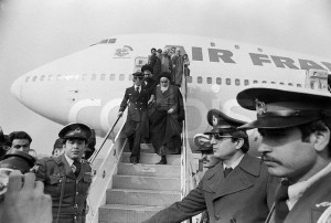 Original caption: 2/1/1979-Tehran, Iran- Ayatollah Ruhollah Khomeini, Iran's main opposition leader, is shown stepping down the Air France plane which brought him to Tehran from 15 years of exile. February 1, 1979 Tehran, Iran